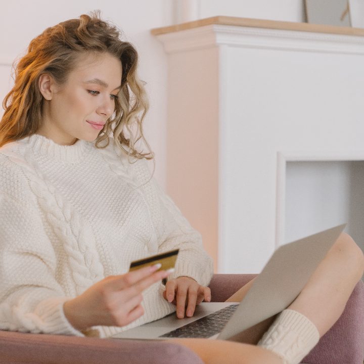 A student paying tuition online with a card