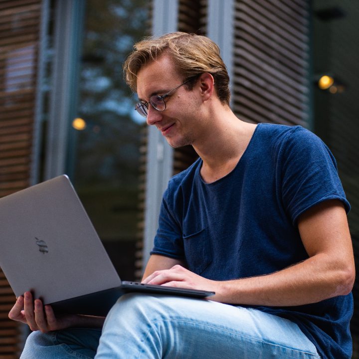 A student studying on a laptop